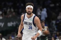 pg中国官网-勇士惜败独行侠，汤普森状态回暖